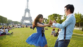 two people at eiffel tower ecTjov.width .jpg