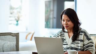 woman on laptop yxSD.width .jpg