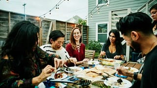 friends at backyard dinner party HUYIuZ.width .jpg