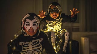 two young boys in Halloween costumes making s.width otPBj.jpg