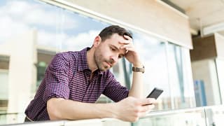 Man upset on phone AOMR.width .jpg
