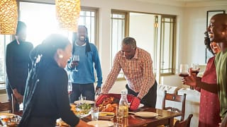family at Thanksgiving table jIYUm.width .jpg
