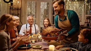 holiday thanksgiving serving turkey family XE.width .jpg