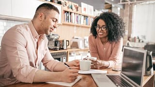 couple go over personal finances oyLcmHJ.width .jpg