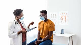 doctor and patient in exam room UdTAfov.width .jpg