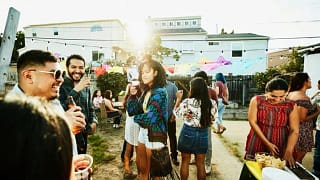 friends at backyard barbecue crUUD.width .jpg