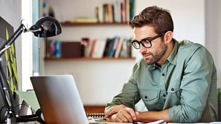 man s glasses laptop gettyimages .jpg