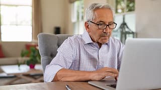 older man serious laptop gettyimages .jpg
