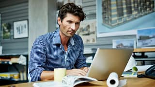 man s laptop concentrating gettyimages .jpg