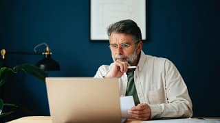 older man laptop gettyimages .jpg