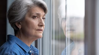 older person looking out of window.jpg