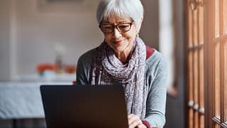 older woman at laptop gettyimages .jpg