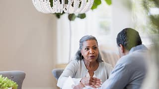 senior couple at table gettyimages .jpg