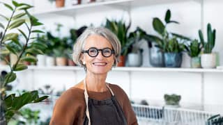older woman with plants.jpg