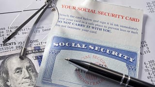 gettyimages social security glasses hundred dollar bill.jpeg