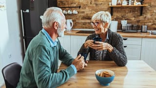 senior couple kitchen table gettyimages .jpg