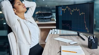 woman stressed desk gettyimages .jpg