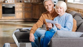 couple looking at check together.jpg