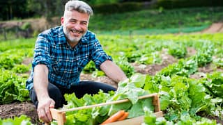 getty gardening smiling happy outdoors.jpg