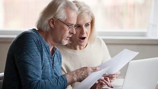 getty images older couple shocked by a bill gettyimages.jpg