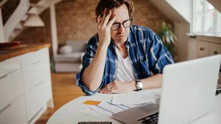 man mid aged laptop stressed.jpg