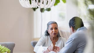 senior couple at table gettyimages .jpg
