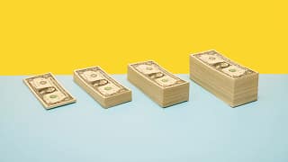 stacks of dollar bills.jpg