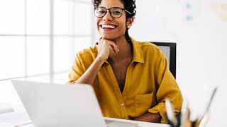 woman s laptop smiling gettyimages .jpg