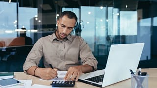 accountant with calculator.jpg