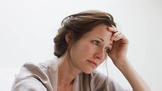 getty sad dismayed unhappy hand on head.jpg
