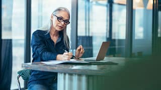 gettyimages older woman working retirement.jpeg