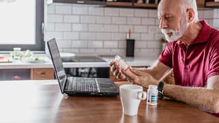 older man pills laptop.jpg