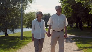 senior couple holding hands outside gettyimages .jpg