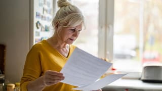 senior looking at documents.jpg