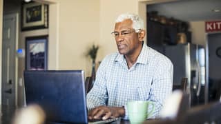 senior man laptop gettyimages .jpg