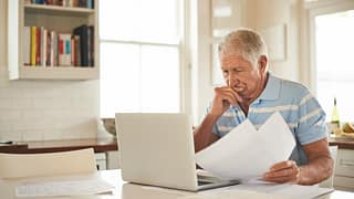 senior man laptop stressed gettyimages .jpg