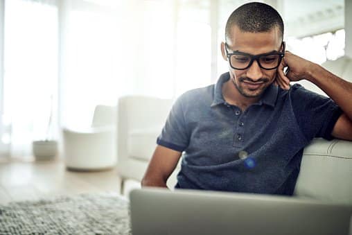 GuyWithGlassesLookingAtLaptop.width AAbSH.jpg