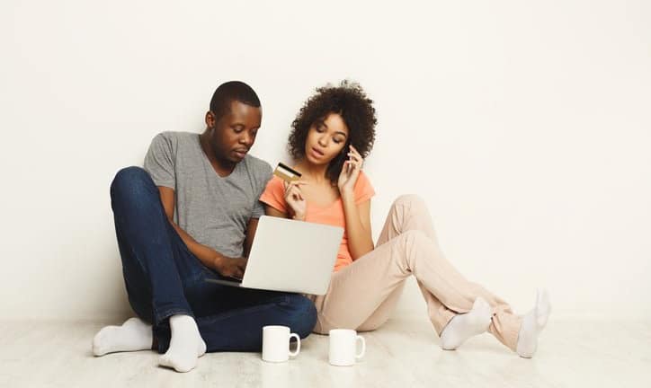 couple with laptop and credit card ZBP.width