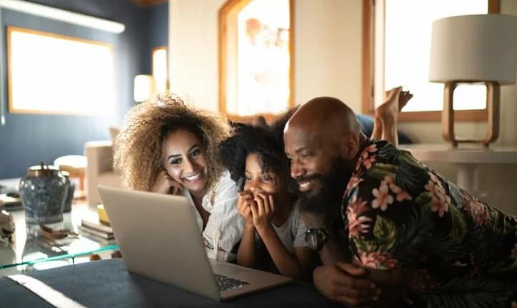 family watching movie on laptop hOMvFmD.width .jpg