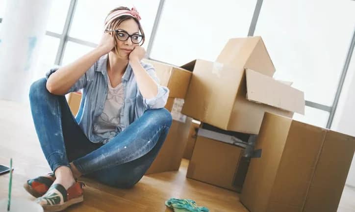 woman with moving boxes wNRmGR.width .jpg