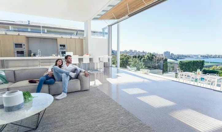 couple on couch in nice house FNNZDZQ.width .jpg