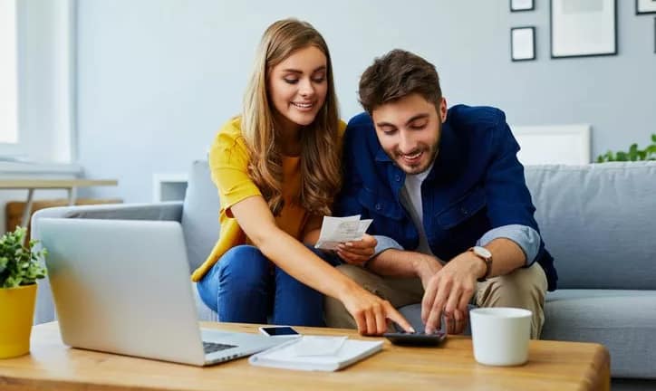 happy couple with calculator wpBfhu.width .jpg