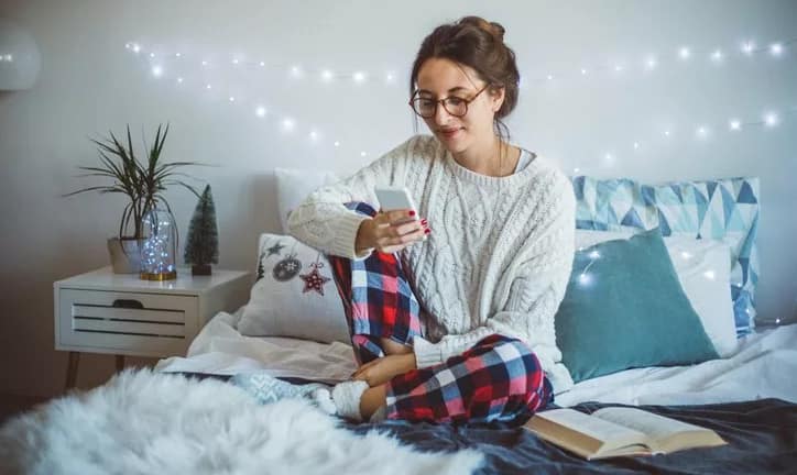 woman on bed on phone.width .jpg