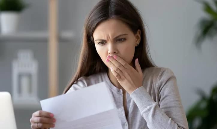 woman surprised at bill.width HBTG.jpg