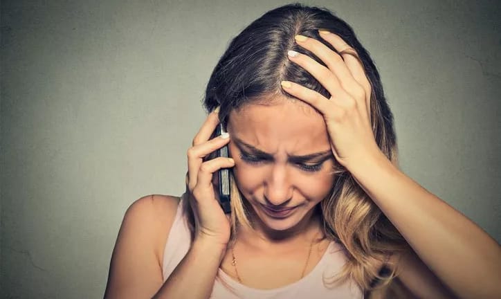 worried on the phone.width .jpg