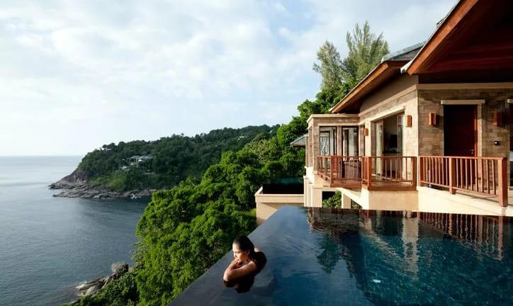 woman in pool luxury hotel gHZAQ.width .jpg