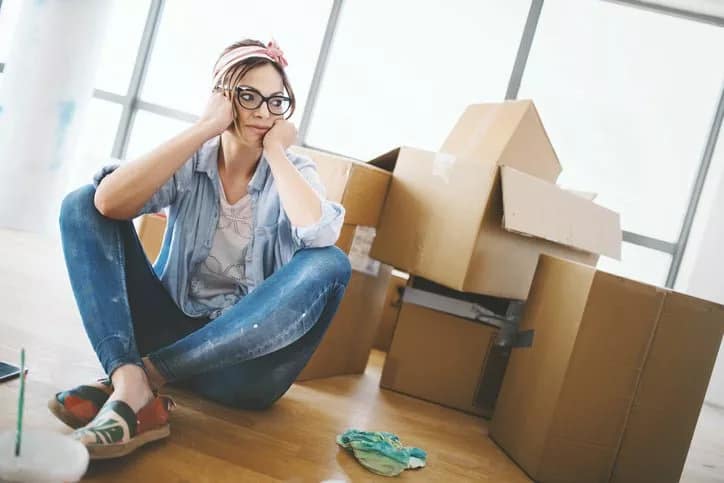 woman with moving boxes wNRmGR.width .jpg
