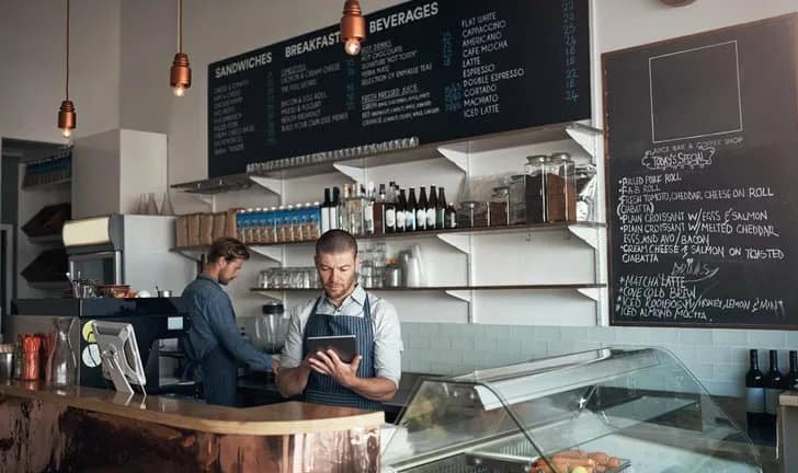 two men working in cafe KDItXBO.width .jpg