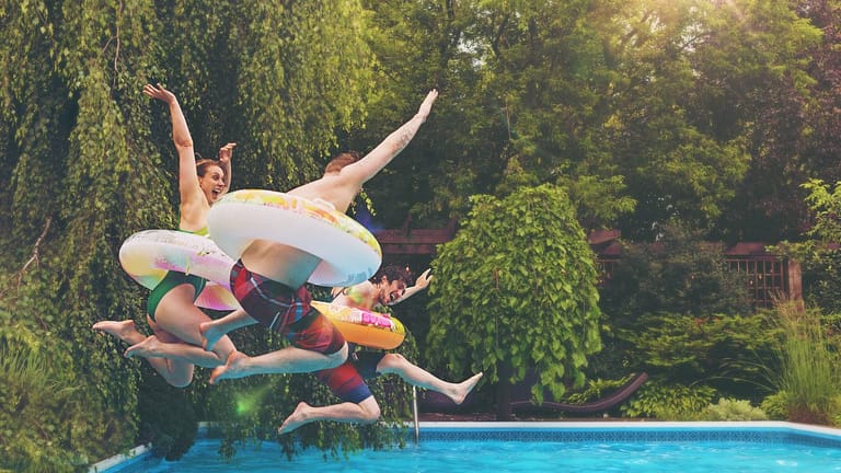 people jumping in pool RyUDQ.width .jpg