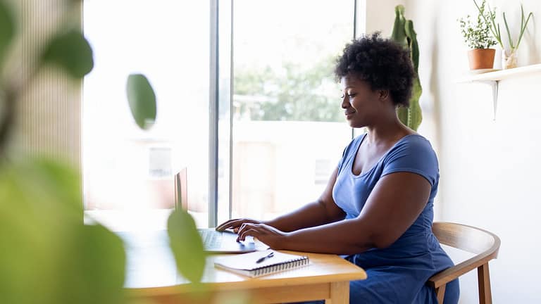 person working at home on laptop eHAgcI.width